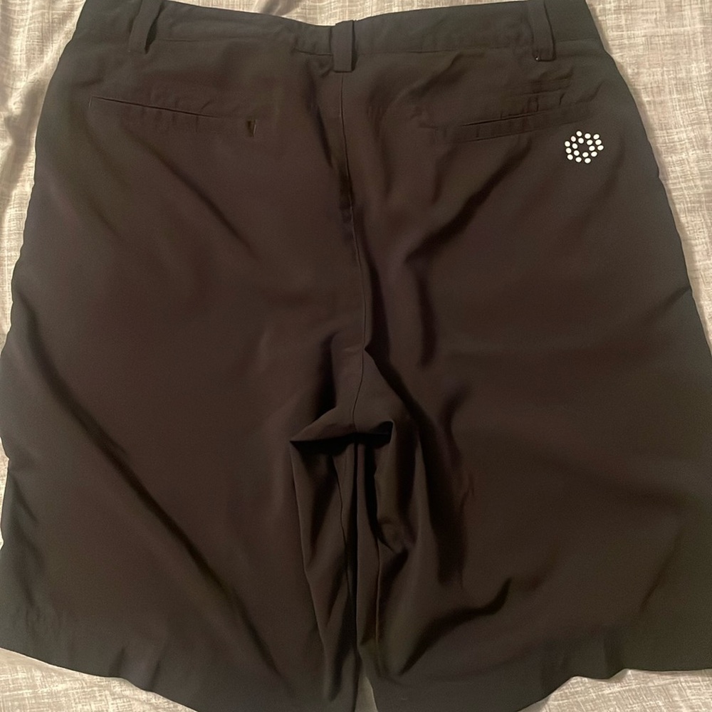 Puma black golf shorts size 34